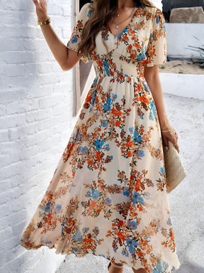 Vestido Midi Floral Fluido com Decote em V e Mangas Curtas – Salma [FRETE FULL]