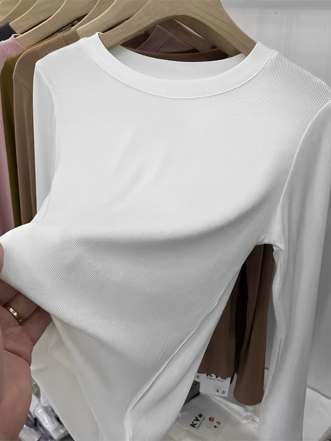 Blusa de Manga Longa Texturizada com Gola Redonda – Izabele