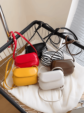 Bolsa Feminina em Couro PU com Design Arredondado e Alça Regulável – Odete
