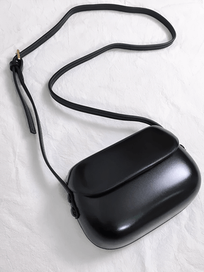 Bolsa Feminina em Couro PU com Design Arredondado e Alça Regulável – Odete