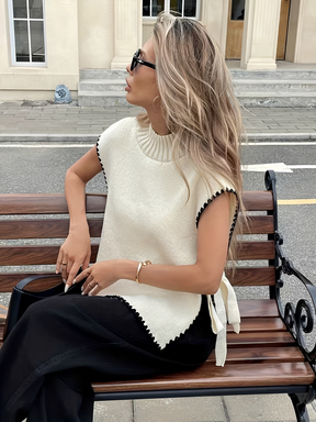 Colete em Tricô Oversized com Gola Alta e Amarração Lateral - Callie