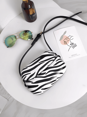 Bolsa Feminina em Couro PU com Design Arredondado e Alça Regulável – Odete