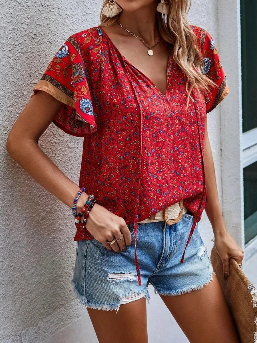 Blusa de Viscose com Mangas Borboleta e Estampa Floral – Tereza
